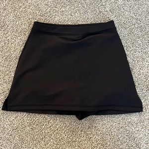 We Wore What black tennis skirt size small